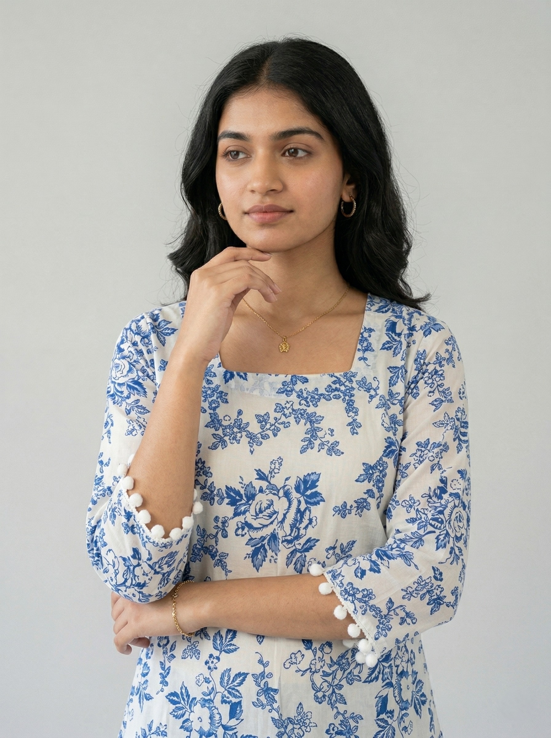 White base with Blue floral print short kurti
