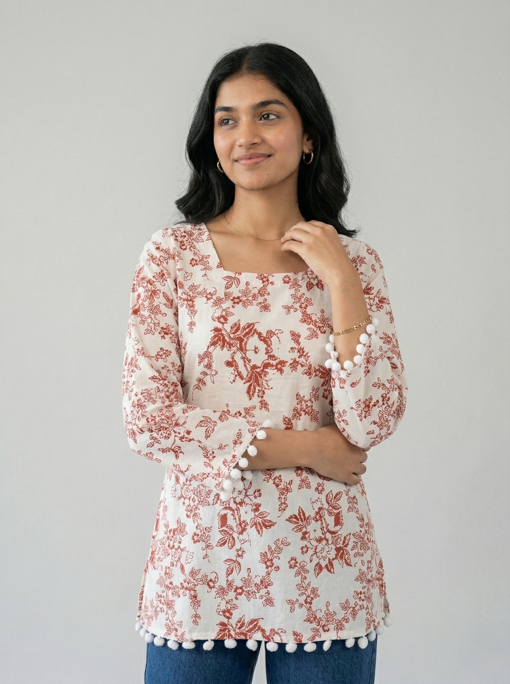 white base red floral print short kurti 