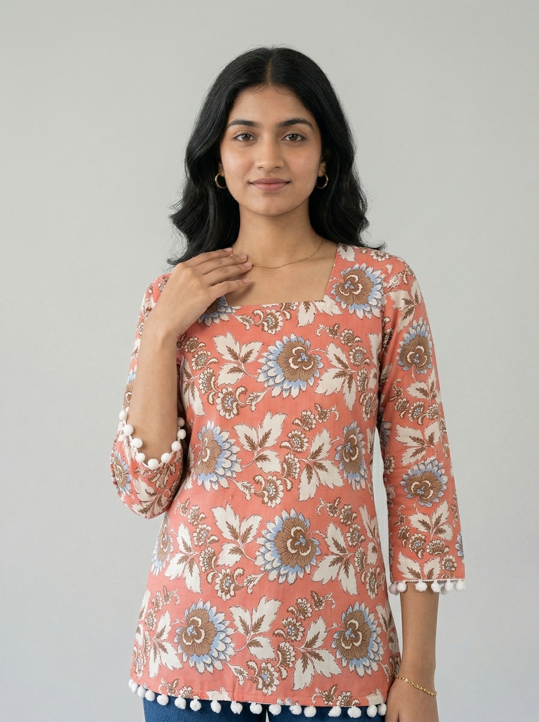 peach color.  floral printed cotton short kurti 